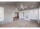 Bright sunroom with tile flooring, many windows, and vaulted ceiling, providing ample access to outside at 3858 Vineyards Lake Nw Cir # U-19, Kennesaw, GA 30144