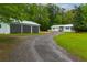 Long driveway leads to the house and large garages at 505 Cedar Creek Nw Rd, Cartersville, GA 30121