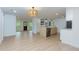 Open concept kitchen and living area with hardwood floors and stainless steel appliances at 505 Cedar Creek Nw Rd, Cartersville, GA 30121
