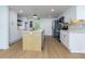Spacious kitchen featuring white cabinets, stainless steel appliances and a center island at 505 Cedar Creek Nw Rd, Cartersville, GA 30121