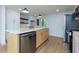 Bright kitchen with a center island, stainless steel appliances, and modern fixtures at 505 Cedar Creek Nw Rd, Cartersville, GA 30121