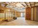 Unfinished basement features exposed framework, creating a versatile space for customization at 135 Antoinette Ave, Mcdonough, GA 30252
