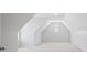 Bonus room with dormers and carpet flooring at 135 Antoinette Ave, Mcdonough, GA 30252
