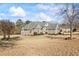 Beautiful home on spacious lot features an expansive front yard and well-maintained landscaping at 135 Antoinette Ave, Mcdonough, GA 30252