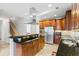 Spacious kitchen featuring an island, stainless steel appliances, and beautiful cabinetry at 135 Antoinette Ave, Mcdonough, GA 30252
