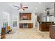 Bright kitchen with a work station area with wood cabinets and tile flooring at 135 Antoinette Ave, Mcdonough, GA 30252
