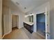 Modern bathroom featuring a double sink vanity with dark wood cabinets and tile flooring at 156 Crescent Wooode Dr, Dallas, GA 30157