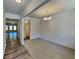 Inviting dining room with a chandelier and wood-look flooring, perfect for Gathering gatherings at 156 Crescent Wooode Dr, Dallas, GA 30157