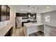 Modern kitchen with stainless steel appliances, granite countertops, and ample cabinet space at 156 Crescent Wooode Dr, Dallas, GA 30157