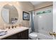 Cozy bathroom with a shower and tub combo, vanity, and a framed picture on the wall at 1270 Cameron Crk, Marietta, GA 30062