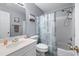 Cozy bathroom with a shower and tub combination, vanity with sink, and blue patterned shower curtain at 1270 Cameron Crk, Marietta, GA 30062
