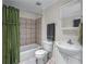 Clean bathroom with a bathtub, shower, sink, and ample lighting at 1270 Cameron Crk, Marietta, GA 30062