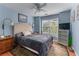 Relaxing bedroom with a ceiling fan, natural light from the window, and comfortable furnishings at 1270 Cameron Crk, Marietta, GA 30062