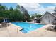 Community pool area with lounge chairs, umbrellas, and a well-maintained pool at 1270 Cameron Crk, Marietta, GA 30062