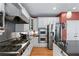 Modern kitchen features stainless steel appliances, a gas cooktop, and ample counter space at 1270 Cameron Crk, Marietta, GA 30062
