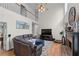 Bright living room with hardwood floors, fireplace, soaring ceilings, and oversized windows for natural light at 1270 Cameron Crk, Marietta, GA 30062