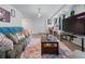 Inviting living area featuring a comfortable couch, stylish decor, and a dining area for entertaining at 1270 Cameron Crk, Marietta, GA 30062