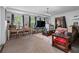 Spacious living room with a table for dining, comfortable furniture, and plenty of space for entertaining at 1270 Cameron Crk, Marietta, GA 30062