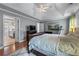 Spacious main bedroom offers an ensuite bathroom, hardwood floors, and a walk-in closet at 1270 Cameron Crk, Marietta, GA 30062