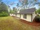 Home backyard view, features a storage shed at 2424 Turtle Xing Ne, Marietta, GA 30066
