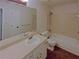 Standard bathroom featuring a combined bathtub and shower, along with vanity sink at 2424 Turtle Xing Ne, Marietta, GA 30066