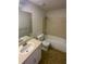 Full bathroom featuring a shower-tub combo and vanity sink at 2424 Turtle Xing Ne, Marietta, GA 30066