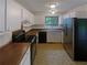 Well-lit kitchen with white cabinets and modern appliances, offering functionality at 2424 Turtle Xing Ne, Marietta, GA 30066