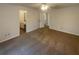 Spacious main bedroom with neutral carpet, fan, and access to an en-suite bathroom at 2424 Turtle Xing Ne, Marietta, GA 30066