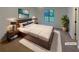Comfortable bedroom with a large window providing natural light and stylish decor at 2424 Turtle Xing Ne, Marietta, GA 30066