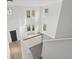 Open foyer with high ceilings, large windows, and modern chandelier at 3465 Caney Creek Ln, Cumming, GA 30041
