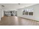 Bright open-concept space integrates kitchen with island and living area with natural light at 3465 Caney Creek Ln, Cumming, GA 30041