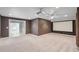 Theater room with projector screen and neutral carpeting at 3465 Caney Creek Ln, Cumming, GA 30041