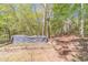 A wooded lot showcasing a natural landscape, and rustic charm at 3775 Belle Glade Trl, Snellville, GA 30039