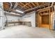 Unfinished basement with exposed ceilings and concrete floors at 3775 Belle Glade Trl, Snellville, GA 30039