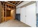 Unfinished basement space with exposed framing and concrete floor at 3775 Belle Glade Trl, Snellville, GA 30039