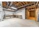 An unfinished basement area shows exposed ductwork, a concrete floor, and block walls at 3775 Belle Glade Trl, Snellville, GA 30039