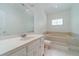 Bright bathroom with large vanity, soaking tub, and plenty of space to unwind and relax at 3775 Belle Glade Trl, Snellville, GA 30039