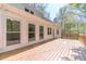 Large wood deck provides outdoor entertainment space and scenic views at 3775 Belle Glade Trl, Snellville, GA 30039