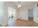Open dining space with modern lighting, new floors and access to the sunroom at 3775 Belle Glade Trl, Snellville, GA 30039