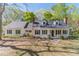 Charming home with a welcoming porch and neatly landscaped front yard, perfect for enjoying the outdoors at 3775 Belle Glade Trl, Snellville, GA 30039