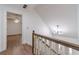 Open hallway with wood flooring and a view to a bedroom with a ceiling fan at 3775 Belle Glade Trl, Snellville, GA 30039