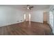 Bright living room with hardwood floors, fireplace, and glass doors leading to an outdoor area at 3775 Belle Glade Trl, Snellville, GA 30039
