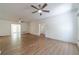Large living area showcasing new floors, neutral paint, and a smooth flow into adjoining rooms at 3775 Belle Glade Trl, Snellville, GA 30039