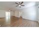 Bright and airy living room featuring new flooring and neutral paint at 3775 Belle Glade Trl, Snellville, GA 30039