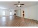 Spacious living room with fireplace, built-in shelving, and access to the kitchen at 3775 Belle Glade Trl, Snellville, GA 30039