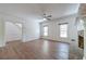Bright living room with a brick fireplace, large windows, and seamless transition to other spaces at 3775 Belle Glade Trl, Snellville, GA 30039