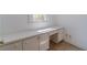 Bright office nook with built-in cabinets, counter space and natural light at 3775 Belle Glade Trl, Snellville, GA 30039