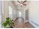 Sunroom with new floors, many windows and French doors at 3775 Belle Glade Trl, Snellville, GA 30039
