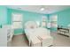 Bright bedroom featuring a white bed frame, furniture, and light walls at 5075 Chase Ln, Cumming, GA 30040