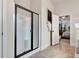 Bathroom showcasing a glass shower and view of the main bedroom at 609 Eskimo Ct, Cts, Hampton, GA 30228